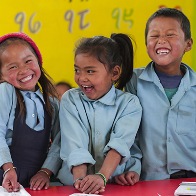 Building a brighter future student and volunteer in Tortola BVI All Hands and Hearts Disaster Relief Nepal Earthquake Recovery Smiling Students