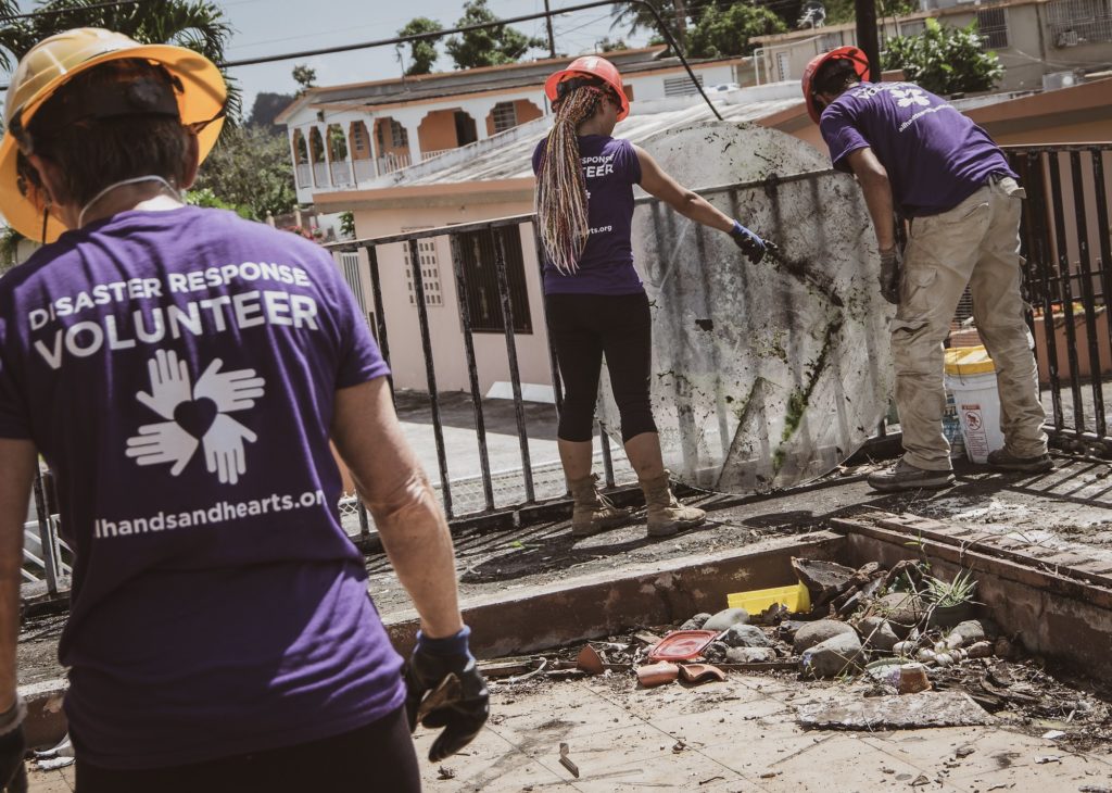 puertorico_pr_usa_hurricane_damage_volunteer_group_working