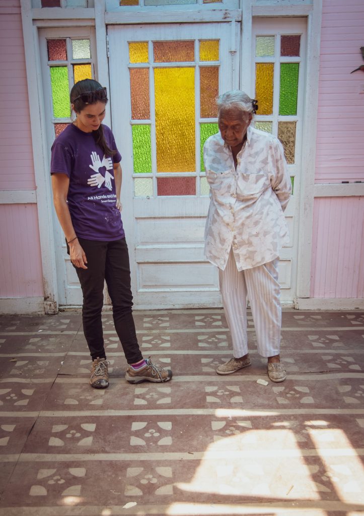 puertorico_pr_usa_hurricane_recovery_volunteer_beneficiary_couple_smiling