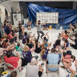 Internatioanl volunteers playing games in a community centre within the US Virgin Islands