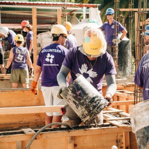 International volunteers rebuilding a school