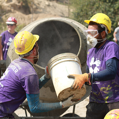 Volunteer Nepal Earthquake Free Disaster Relief NGO Humanitarian Non Profit Donate Guidestar Best Disaster Relief Organization Update 1 Volunteers in Nepal mixing concrete
