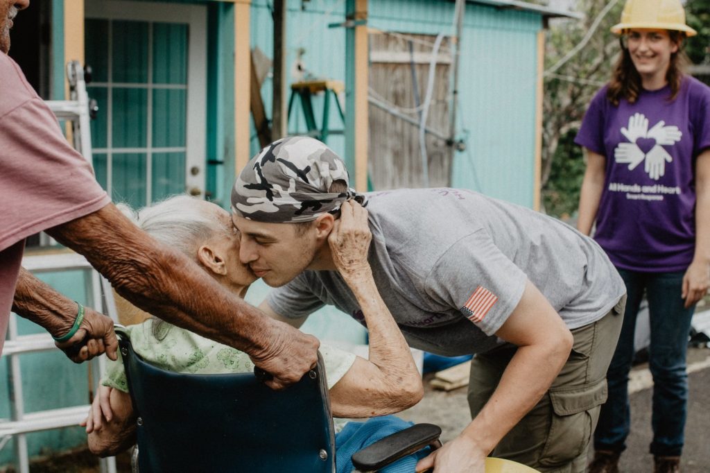 barranquitas_puertorico_pr_usa_renewal_beneficiary_staff_couple_hugging