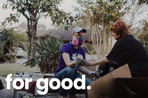 A disaster relief volunteer working with a homeowner