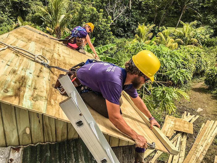 dominica_hurricane_homebuild_roof_recovery_volunteer_couple_working