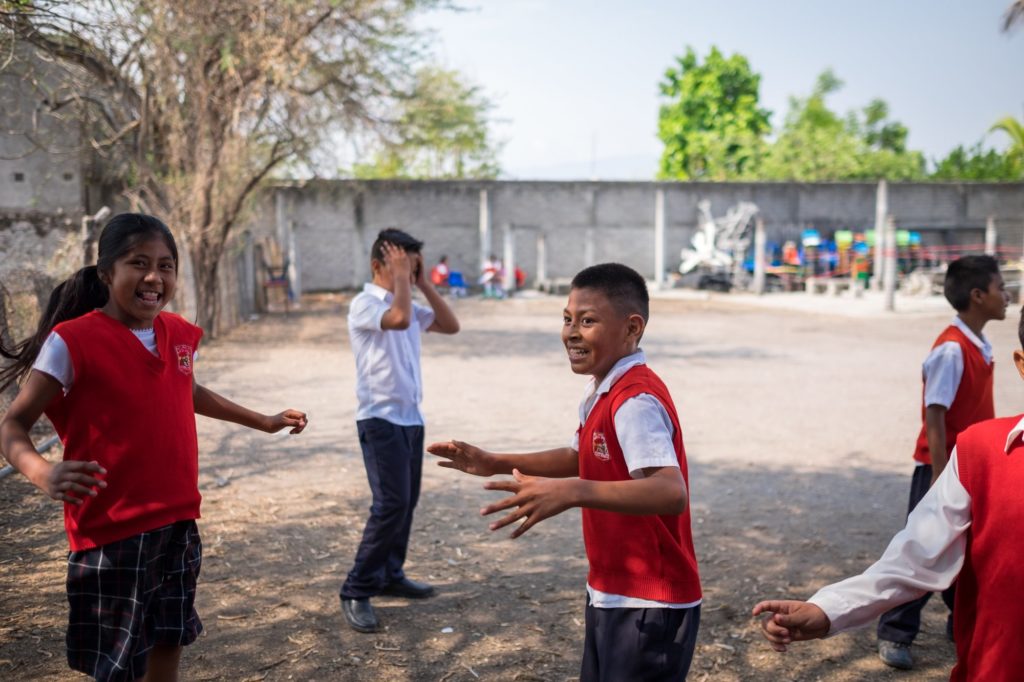 morelos_mexico_earthquake_recovery_schoolbuild_beneficiary_group_smiling