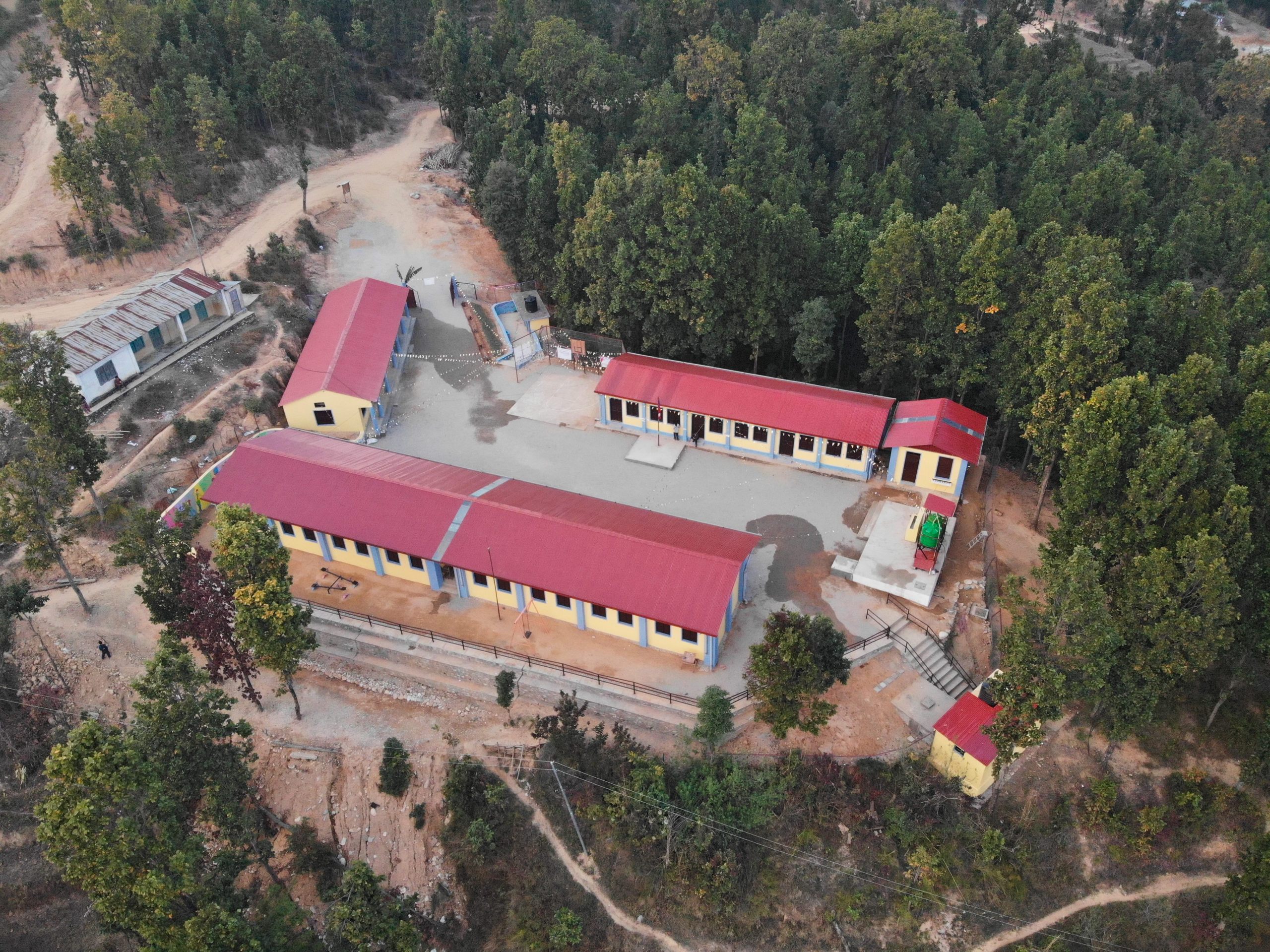 aerial view of a completed school in nepal