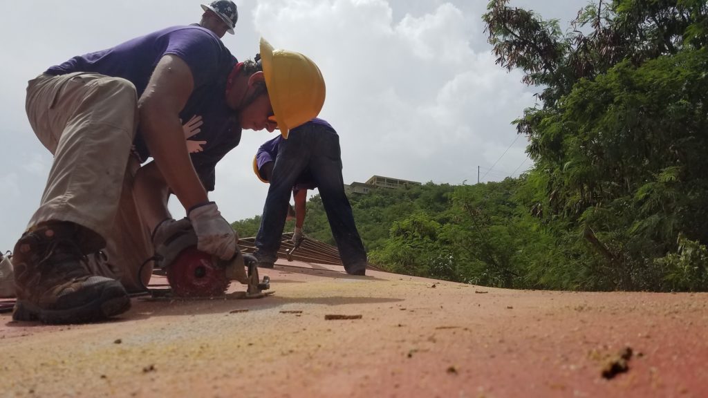 st_thomas_usvi_usa_hurricane_roof_volunteer_group_working