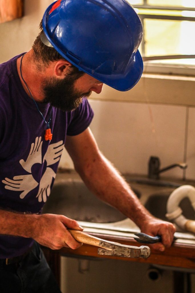 tortola_bvi_hurricane_damage_volunteer_one_working