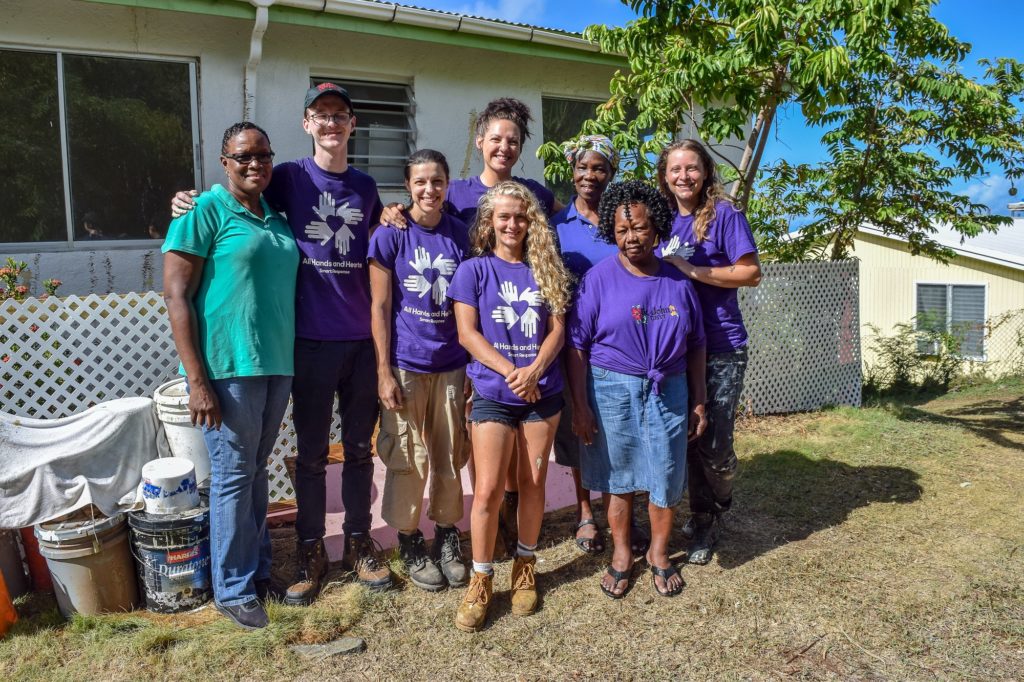 usa_hurricane_response_recovery_volunteer_beneficiary_hugging_smiling