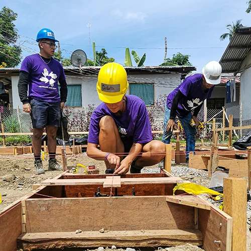 volunteer kneeling