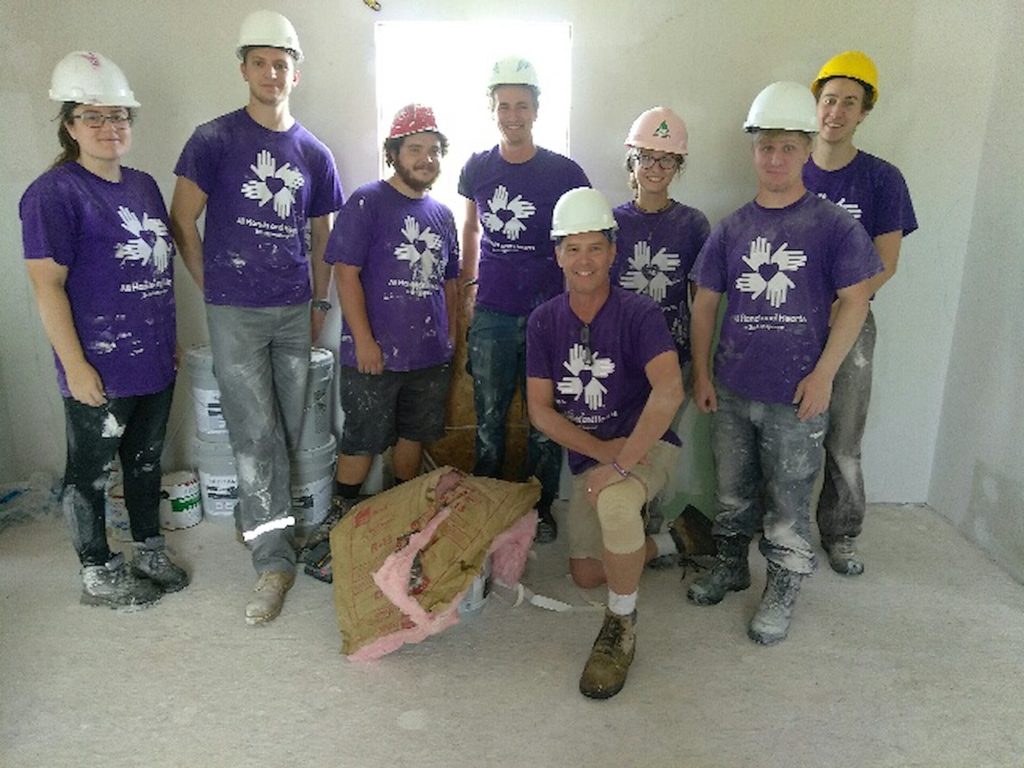 coastal_bend_texas_usa_homebuild_recovery_volunteer_staff_group_smiling