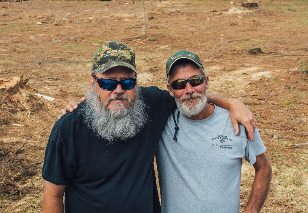 florida_michael_hurricane_response_beneficiary_couple_hugging_smiling