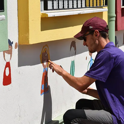 panting picture on side of building