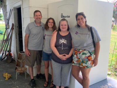 standing in front of storm shelter